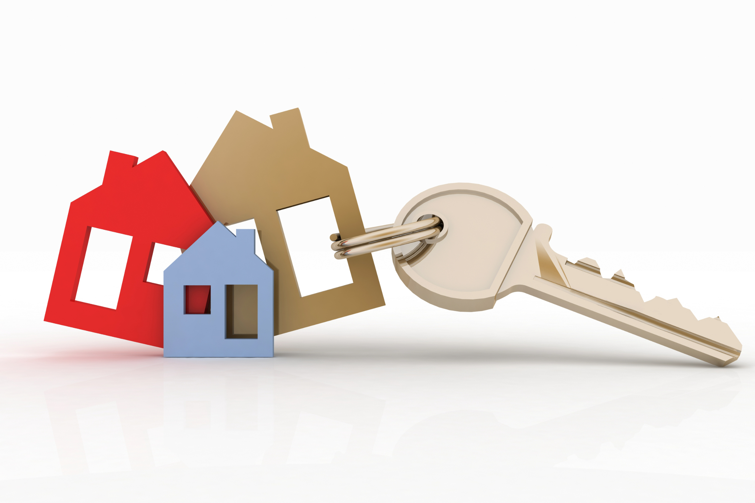 House keys with a colorful keychain on a white background